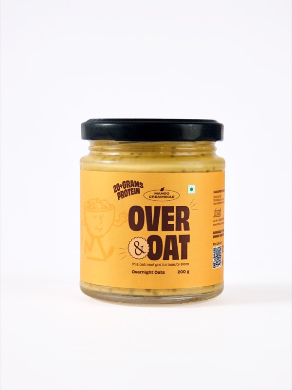 A jar of Over & Oat Mango Creamsicle overnight oats
